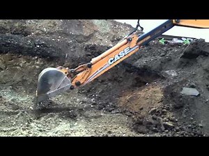 Case 580 super m digging foundation