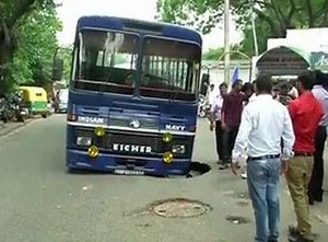100K views · 1.9K reactions | Delhi: Indian Navy bus gets stuck in pothole | The Times of India | Facebook