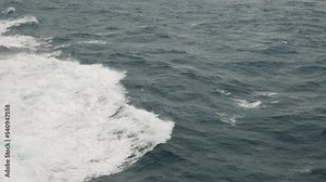 Storm. High waves. White foam on wind. Side view low on water. Wind breaks waves. Splashes Stock Video