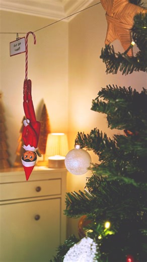 alyse. on Instagram: "YALLLLLL Matt and I nailed holes in the wall for this damn elf so she better like it😆☠️ the tape wasn’t cutting the mustard. . . . . #elfontheshelfideas #elfontheshelf #elfzipline #easyelfontheshelfideas #christmas #holidaytraditions"