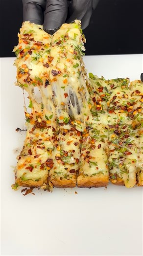 shri_cooking on Instagram: "Cheesy Garlic Bread 🧄🍞 ASMR Cooking 🎧….. #garlicbread #chessygarlicbread #shricooking #shorts #bread"