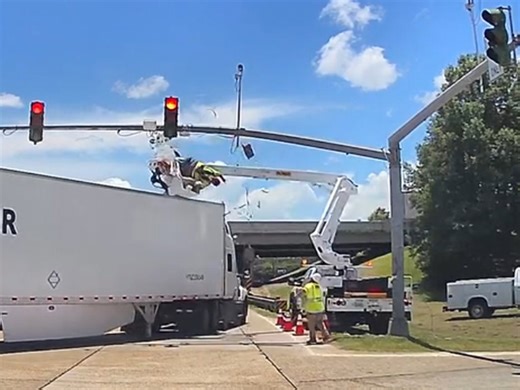 Semi-truck hits electrical worker in truck bucket