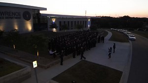 14K views · 429 reactions | A beautiful view from above just before sunrise this morning. It was Department Photo Day at LKPD and the shutter clicked the minute the sun lit up the sky, just as scheduled! Thank you to the Douglas County Sheriff's Office for picking up our calls from 6:30-7:00 am. (Despite the large group, we all line up pretty quickly!) Check back soon for the final photo! | Lawrence Kansas Police Department | Facebook