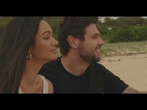 Couple Sitting together on the Beach - Relationship Stock Footage
