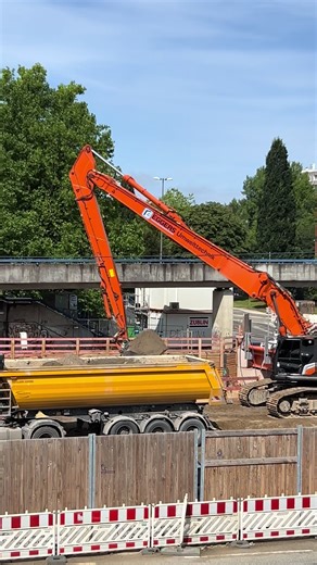 Hitachi Excavator Loading Trucks for Major Civil Project