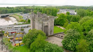 Bunratty Castle, aerial view of the large 15th-century tower house in County Clare, located in the center of Bunratty village, between Limerick and Ennis, Ireland.