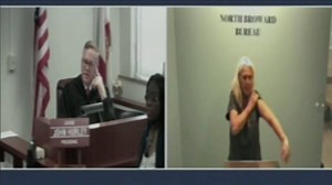 SHOCKING VIDEO: A 54-year-old woman arrested on suspicion of disorderly intoxication caused quite the scene in bond court Thursday when she lifted up her shirt. See more: http://wesh.tv/6004BH85M | Florida Mug Shots