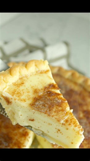 Ever tried a pie that's as nostalgic as a warm hug? 🥧✨ This Old Fashioned Sugar Cream Pie will take you back to simpler times with every creamy bite! Ingredients: - 1 pie crust (at room temperature) - 4 Tablespoons cornstarch - 3/4 cup granulated sugar - 4 Tablespoons salted butter (melted) - 2 1/4 cups heavy whipping cream - 1 Tablespoon vanilla extract - 4 Tablespoons salted butter (melted) - 1/2 cup cinnamon sugar Feeling curious about how to whip this up? Head over to the first comment for 