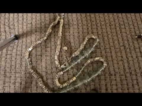 A Small Beaded Necklace, A Glass Beaded Necklace, A Leather Wristband