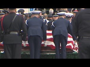 Gun salute and military flyover at Officer Kenneth Copeland's funeral