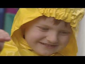Teletubbies: Playing in the Rain (US Version with UK Audio)