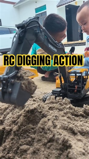 RC Excavator Loading Sand into Dump Truck