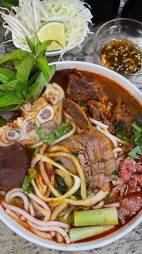 Joedy Tran on Instagram: "Bún Bò Huế (aka) Pho’s Sexy A$$ Cousin………. Quick and simple recipe using beef short ribs. Everyone has their own recipe and this is my. I don’t give a damn what your grandma said heffaa! Recipe: 8-10 medium bowl servings Preparing seasoning • 1 pk- 2oz bun bo hue season (any brand) • 1/4 cup cooking oil • 2 tablespoon minced garlic • 1/4 cup sliced shallots • 3 tablespoon minced lemongrass In a sauce pan add cooking oil, chopped lemongrass, garlic, shallots and bun bo h