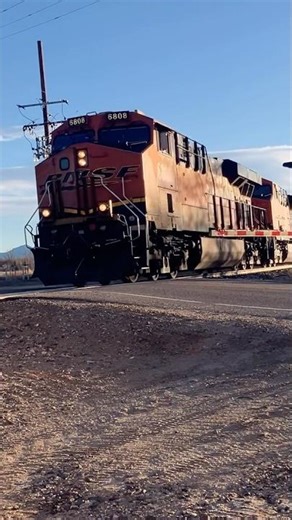 2 BNSF gevos lead a grain train #bnsf #gevo #graintrain #train #short #railfan #shorts #trains