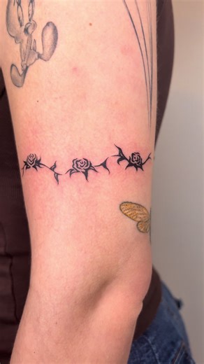 Tattoo Ideas: Barbed Wire vs. Roses