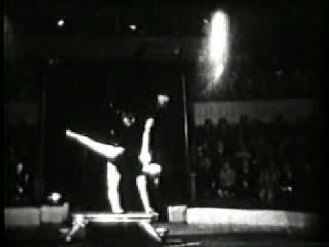 Vintage acrobats strong woman