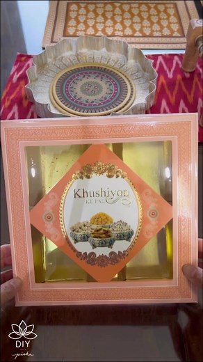 8.1K views · 74 reactions | Re-sharing a craft I tried last year recycling a mithai/dry fruit box into a kite box for a friend. Loved how the bright color enhanced the entire look. Try it on an empty box with kids for home also. Such fun activity it was! #kite#kitelove#kiteflying#uttarayan#pinkzpassion#diywithpinkz#recycle | Pinkz Passion | Facebook