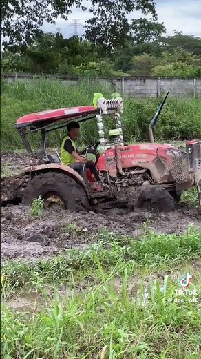 A modified 50 horsepower Kubota tractor with a turbocharger; a racing tractor; a Kubota M9808 tra...