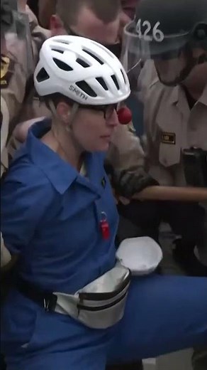 Police scuffle with protesters outside Chicago ICE facility