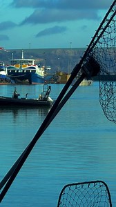Lifeboat standing ready, fishing nets resting between trips, and seagulls keeping a watchful eye 🛟🕊️ Just another calm moment in Weymouth Harbour, where working harbour life and seaside character come together beautifully ⚓️ #LoveWeymouth #WeAreWeymouthTM #ThisIsWeymouth #Weymouth #WeymouthHarbour #SeasideLife #HarbourViews #CoastalMoments | Loving Weymouth & Portland