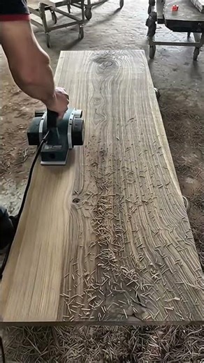 Using Electric Planer to Smooth a Large Slab of Wood Surface