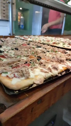 Delicious Large Rectangular Pizza Preparation