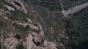 Aerial view of the Benedict church Abbey of Monserrat from Barcelona, Spain. Montserrat Monastery, Santa Maria de Montserrat is a Benedictine abbey located on the mountain of Montserrat
