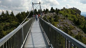 5.5K views · 211 reactions | Mountain Dream Cabins on The Blue Ridge Parkway Ever walked across the mile high swinging bridge on Grandfather Mountain? Here we go... Epic views! Come see us, get a 4th night free and experience this only 20 minutes from us! www.blueridgeparkwaycabinrentals.com | Mountain Dream Cabins on The Blue Ridge Parkway | Facebook