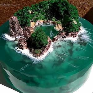 8.1M views · 48K reactions | The mesmerizing island jello cake! By: Zulfiya Cake | MetDaan Cakes | Facebook