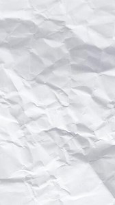 Download Crumpled paper stop motion animation, Textured paper vertical background. The concept of sketch pad, design, retro style, wrinkle, frayed, blank for free