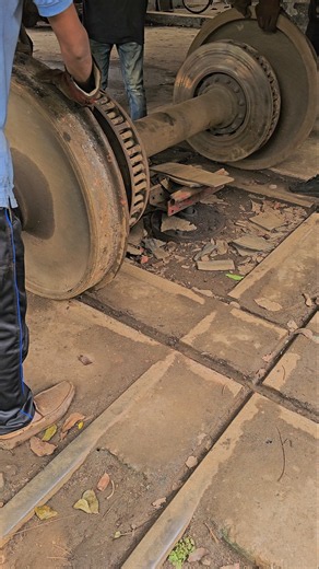 The wheelset is being rotated using hydraulic pressure in the railway workshop | #railway #wheels