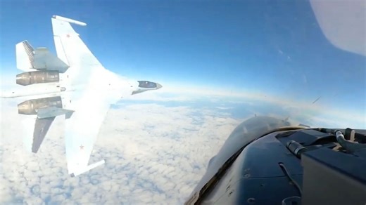 Moment Vlad's pilot steers fighter jet within feet of US plane in near-miss