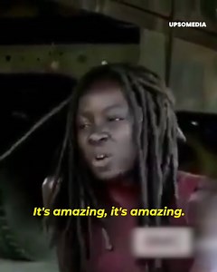 "Norman Reedus couldn't hold back and kissed Danai Gurira at the The Walking Dead backstage. The actress's face says it all... It was totally a surprise 😂 🥰" | Positive