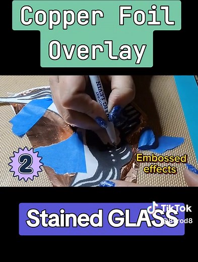 COPPER FOIL Overlay for Stained GLASS! Creating a copper overlay in stained glass involves using thin copper foil to add intricate details and outlines to any of your designs. Here's a brief overview of the process: 1. **Design:** Start with any pattern your heart desires! Identify the areas where you want to incorporate the copper overlay for the added details. 2. **Adding the Copper Foil to prepare Overlay:** Wrap each glass piece with the copper foil and press the foil tightly(do not burnish