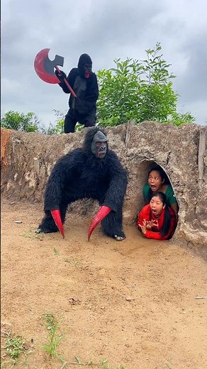 2 ferocious gorilla monsters attack 2 beautiful brave girls in fear hiding for help