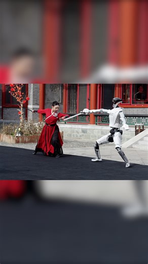 A humanoid robot transforms into a martial arts master, performing a Chinese sword dance with precise movements. Balancing strength and grace, man and machine perform together, staging the ultimate collision of technology and martial arts. #BetterLife #SpringFestival2026 #ChinaAgenda2026 #LanternFestival2026 | China Plus Culture