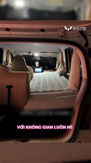 ADMIRING THE MINI BEDROOM INSIDE THE WULING MACARON