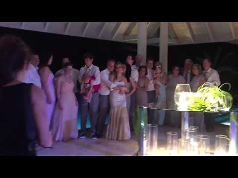 Jumping in Pool at End of Wedding at Jumby Bay