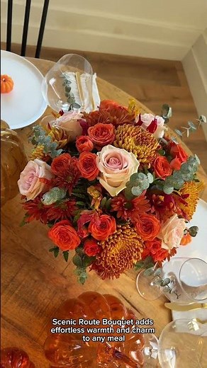 Proflowers Scenic Route bouquet brings vibrant orange, peach, and bronze blooms to your table.