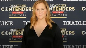 Amy Schumer dances topless at Oscars wardrobe fitting