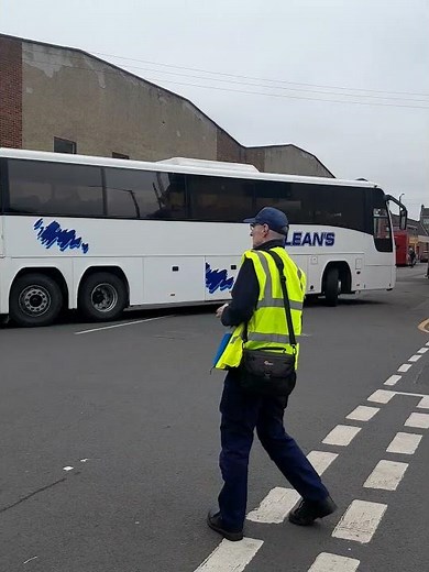 McLeans Coaches Volvo B12B Plaxton Panther (AVI2803) departing Bridgeton on a Coach run