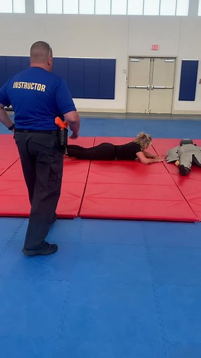 Female Law Enforcement Officer Exposes Taser 7