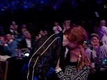 Ed Sheeran kisses wife Cherry Seaborn as he heads on stage to deliver speech