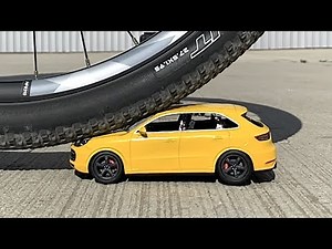 Сrushed Porsche with a bicycle