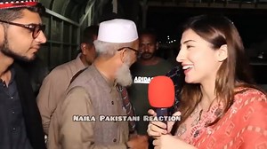 Female Pakistani reporter confronts man who tries to cover her hair...
