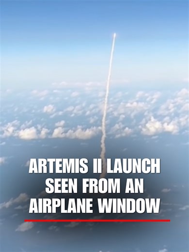 SPACE SEAT: A passenger captured a rare midair view of the Artemis II launch from an airplane window.