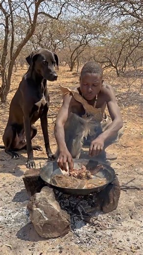 Hadzabe Cooking with Small Fire and Embers #Hadzabe #SmallFire #Embers #PrimitiveCooking #shorts