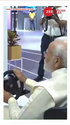 #WATCH: PM Modi drives car in Europe virtually from Delhi using 5G technology #PMModi #5G #5GIndia | Zee News English