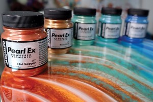 2.2K views · 42 reactions | Annie Morcos creates a stunning piece of artwork using epoxy resin with the 5 NEW Pearl Ex colors: Knox Gold, Hot Copper,Duo Purple-Blue, Duo Aqua-Blue, and Duo Green-Yellow. https://www.jacquardproducts.com/pearl-ex | Jacquard Products | Facebook