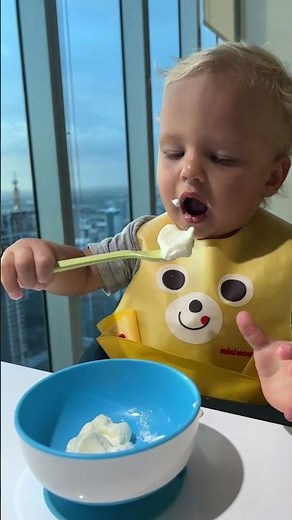 So yummy yogurt! Baby David eating yogurt by himself